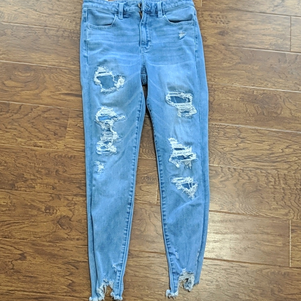 american eagle light blue ripped skinny jeans